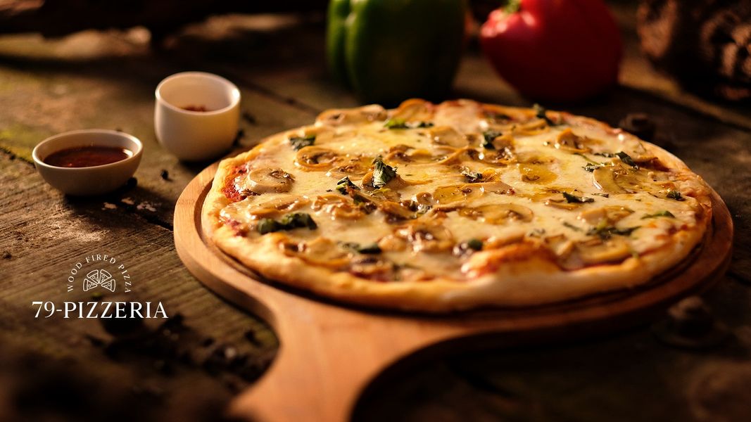 79 Pizzeria serves wood-fired pizza in Dhaka. Available in Munchies for home delivery across Dhaka